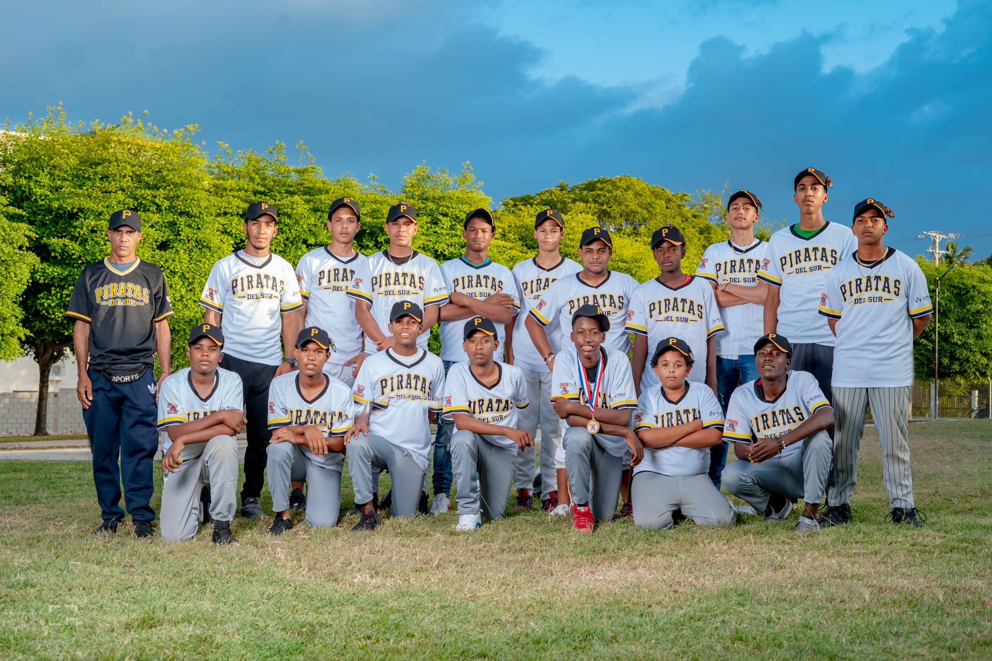 Empower Baseball team celebrating graduation and baseball success