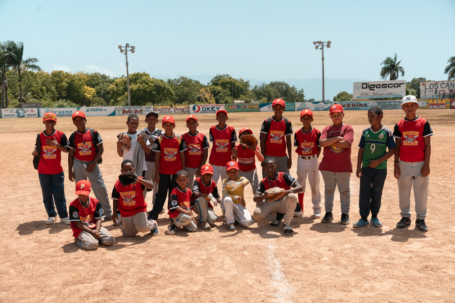 Empower Baseball youth team in Barahona Dominican Republic wearing team uniforms