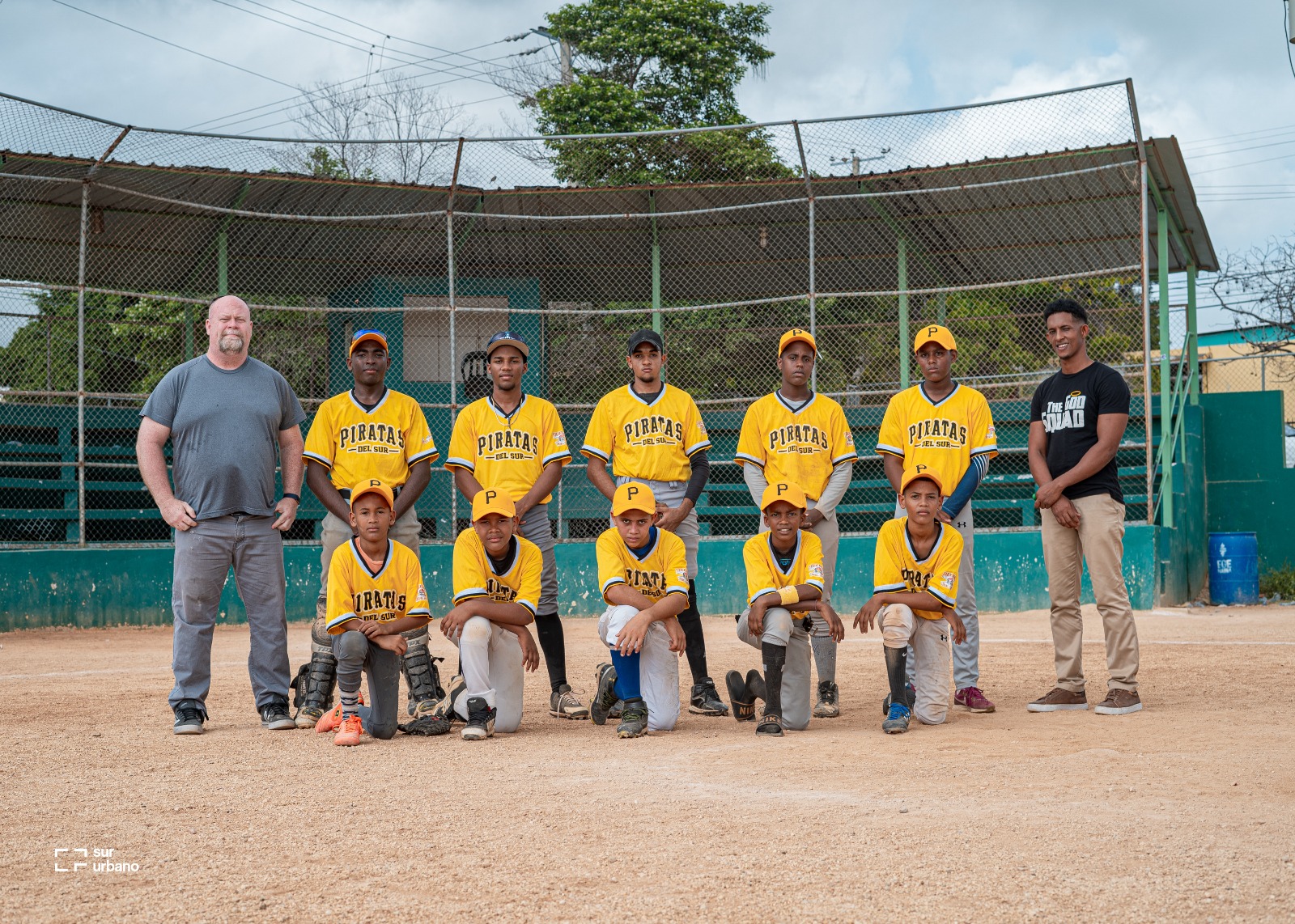 Dominican youth playing baseball Empower Baseball program safe field